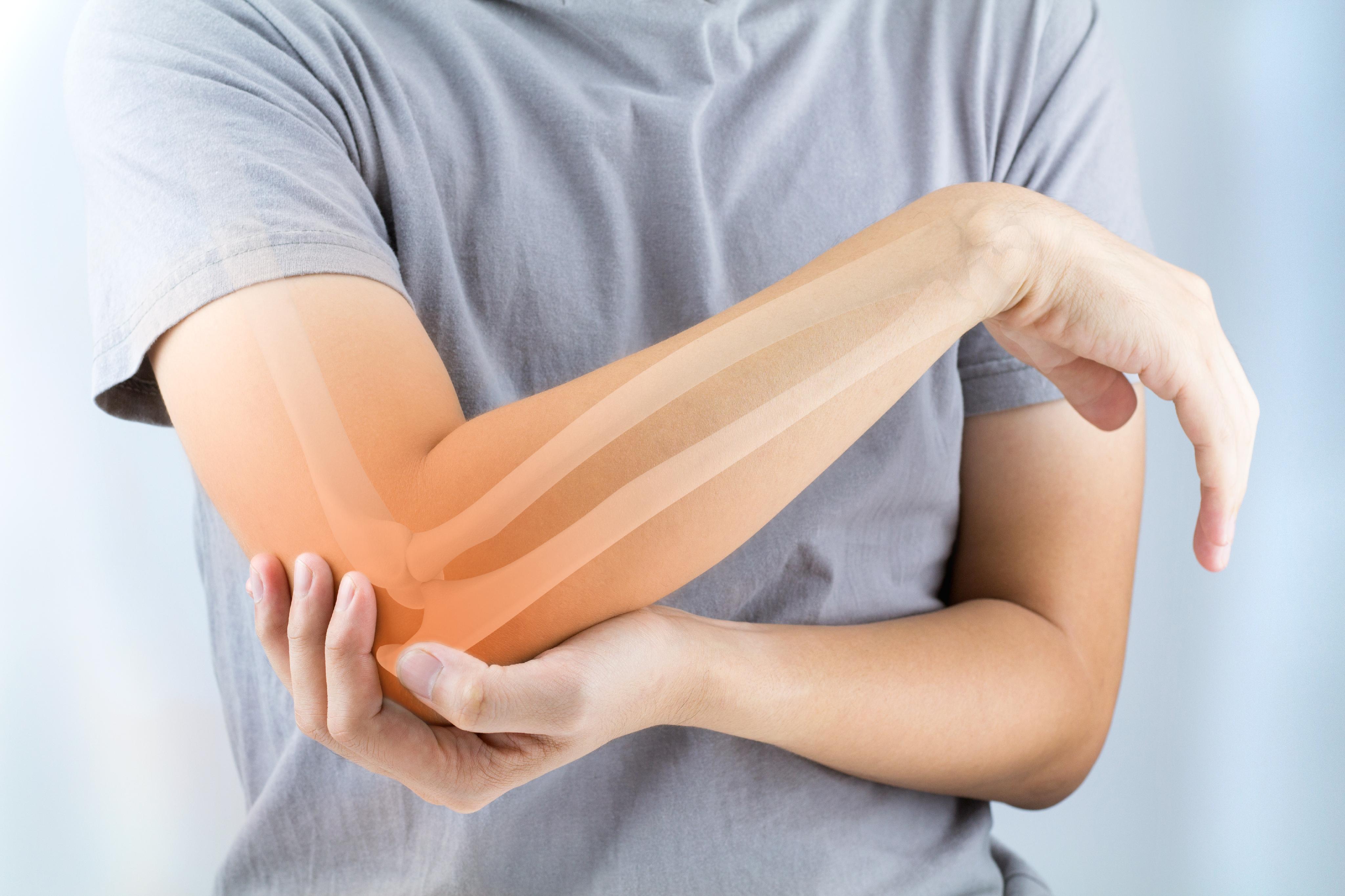 elbow tendon injury symptoms